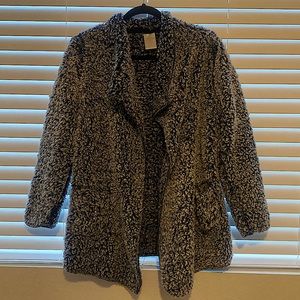 Comfy sweater with pockets. Color is dark blueish and white.